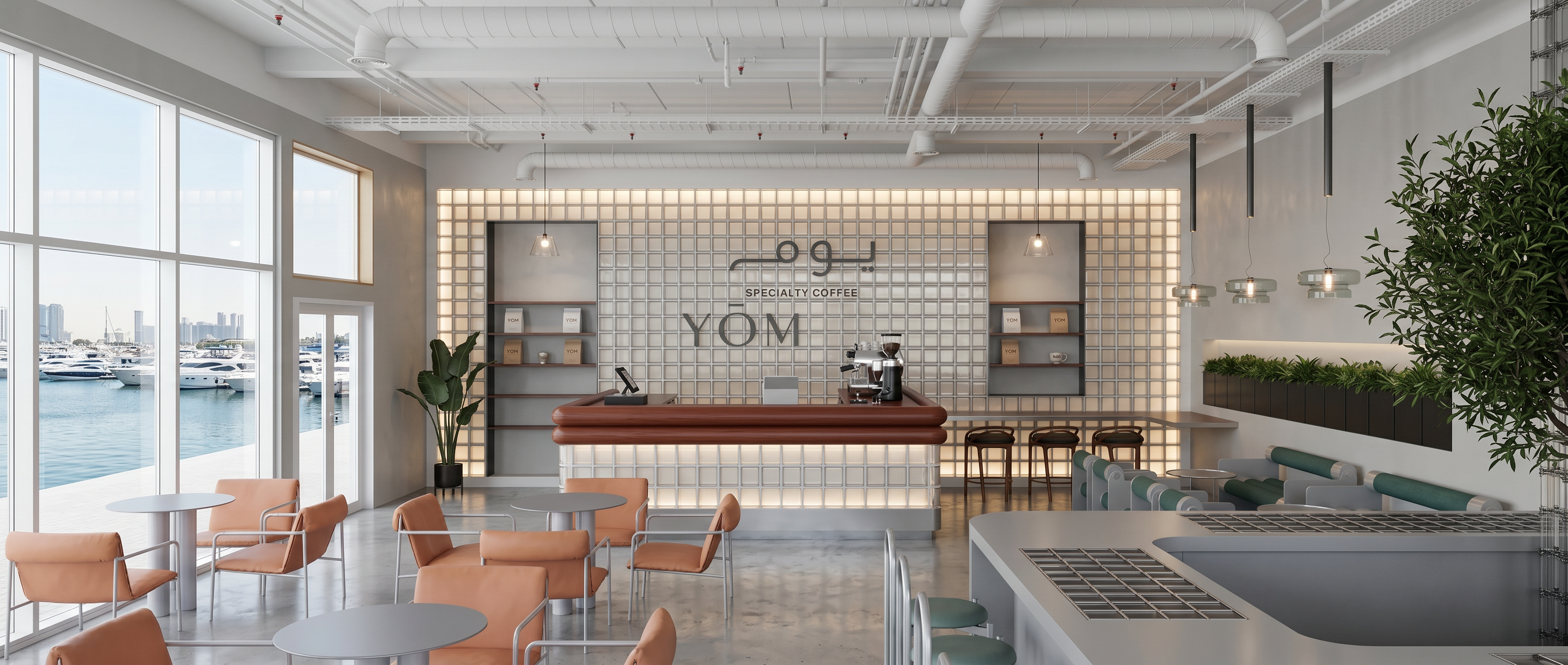 YOM Marina — bright cafe with a panoramic Riyadh Marina sea view, terracotta-leather chairs, a white-marble bar and YOM signage
